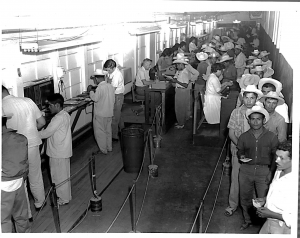 Processing line for Braceros at Immigration, El Paso, Texas, 1955. Source: United States Customs and Immigration Services History Office and Library. Processing line for Braceros at Immigration, El Paso, Texas, 1955. Source: United States Customs and Immigration Services History Office and Library.