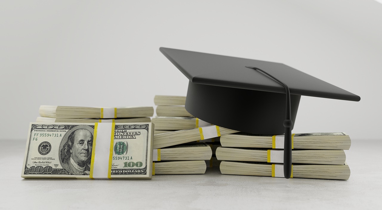 money and a graduation cap